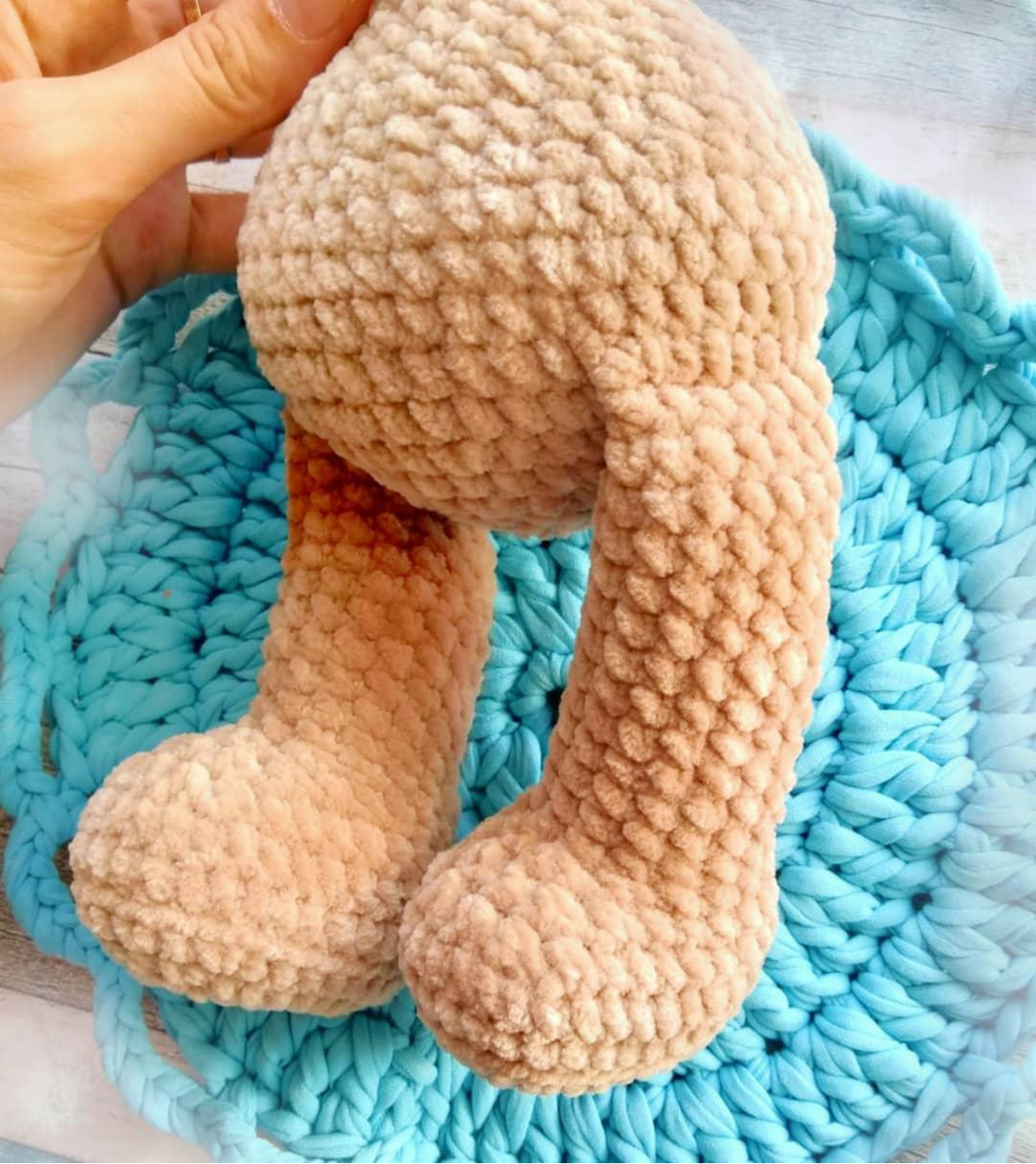 Attaching the crochet legs directly to the teddy bear's body