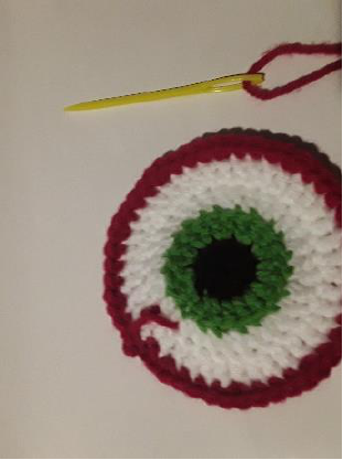 The finished black outline around the iris.