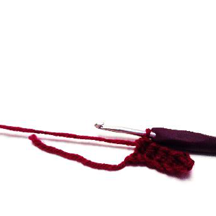 Step-by-step crochet showing chain 7 and 5 HDC stitches