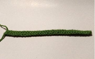 Crocheting the red petal base for the rose