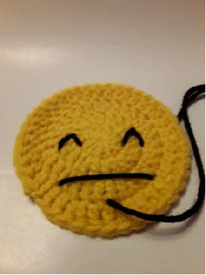 Almost finished with the smile.