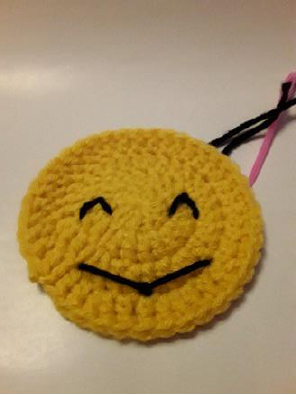 The completed embroidered smile.