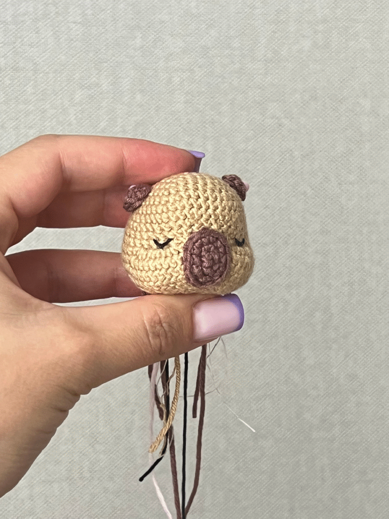 Crochet snout pinned to the head for placement