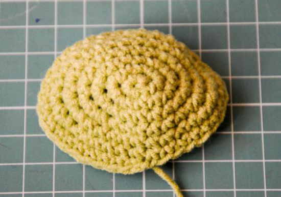 Base of the crocheted olive green hand