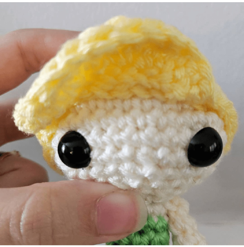 Crocheted scarf with yellow and orange stripes