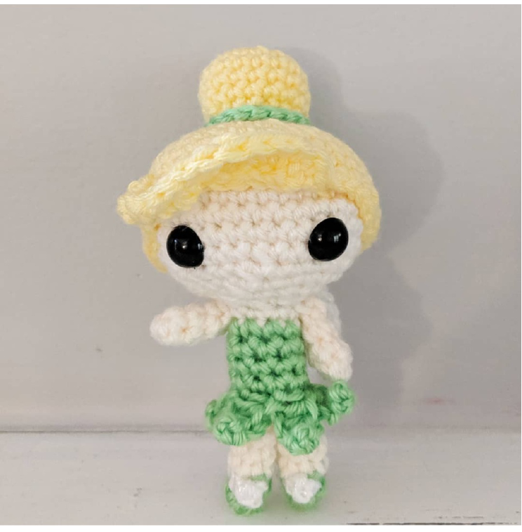 Crocheted vest with armholes formed, laid flat