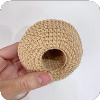 The fully stuffed and closed capybara pot after Row 41.