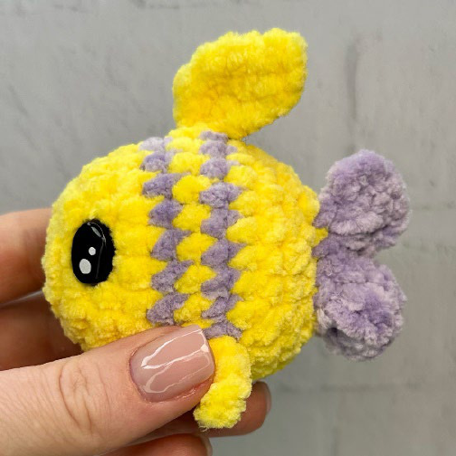 Finished yellow crochet fish with tail
